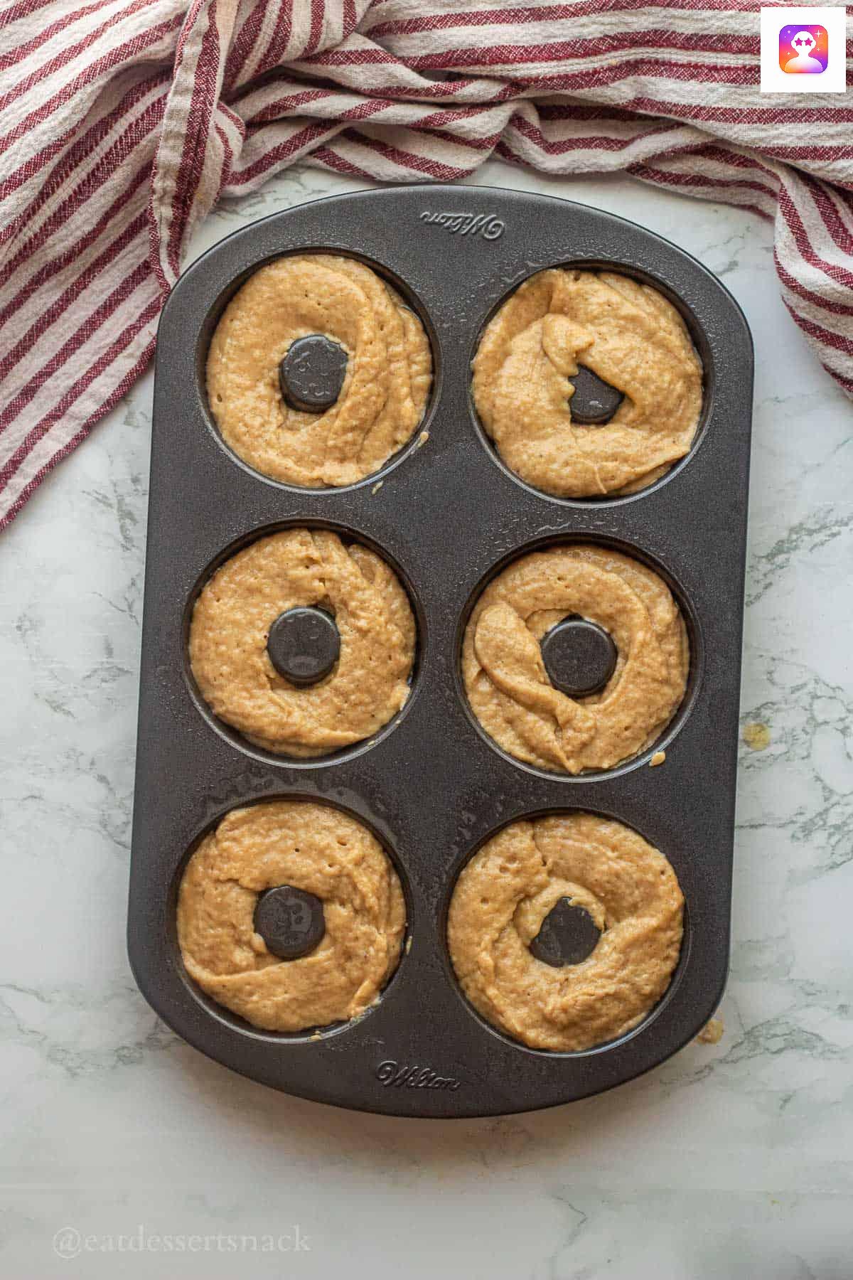Batter in donut pan.